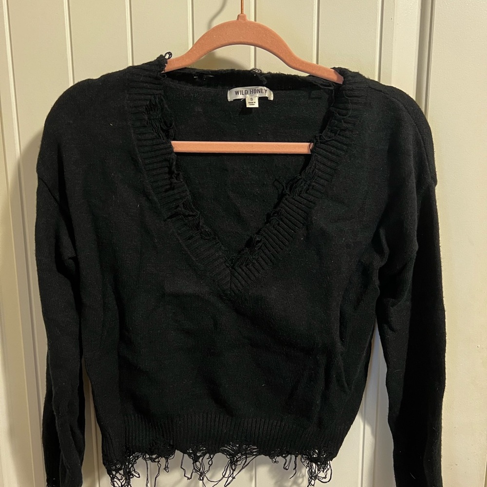 Distressed black sweater